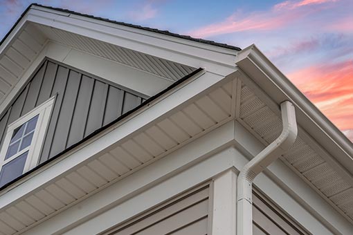 rain spout and gutters on corner of house